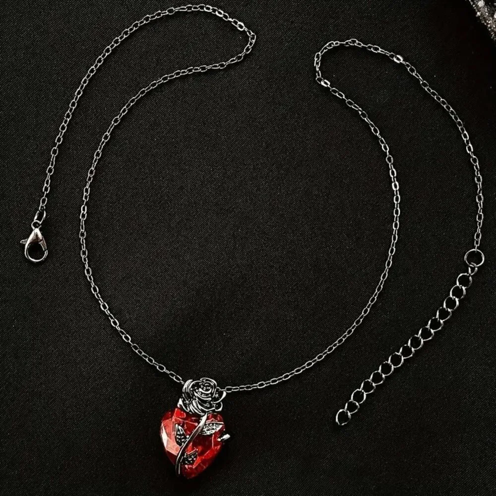 Gothic Gun Metal Rose Wrapped Around Ruby Heart Necklace